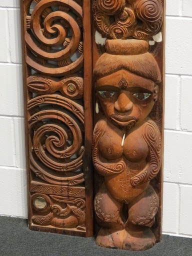 Female Maori carving